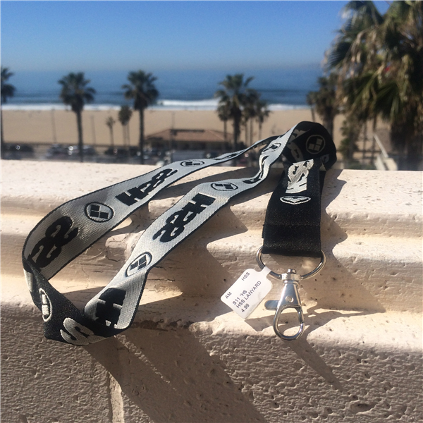 black lanyard with beach in background