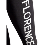 forearm of wetsuit with the word florence in white 