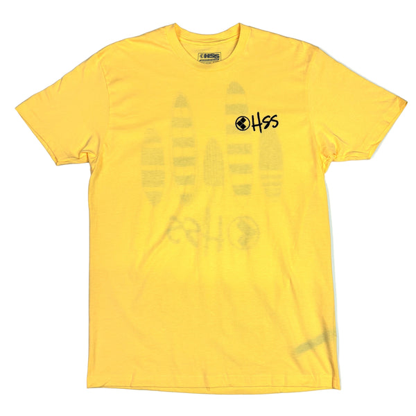 Yellow t-shirt with text and graphics on a white surface