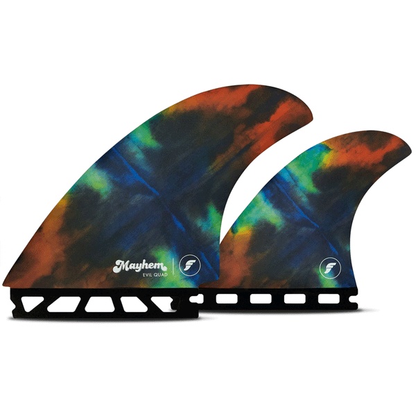 2 TIE DYE SURF FINS ON A WHITE BACKGROUND