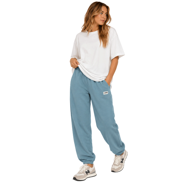 person wearing light blue sweatpants with side pockets and small HSS patch logo