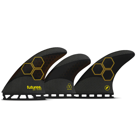 3 surf fins with Channel Island surfboard logo on each. 