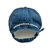back of dad hat with adjustable strap and text " Huntington Beach, California" 
