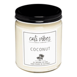 white jar candle with black lid