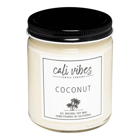 white jar candle with black lid