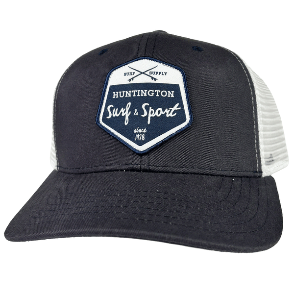 navy blue and white trucker hat with blue and white patch logo