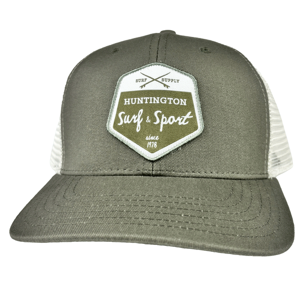 olive green and white trucker hat with white and green patch logo
