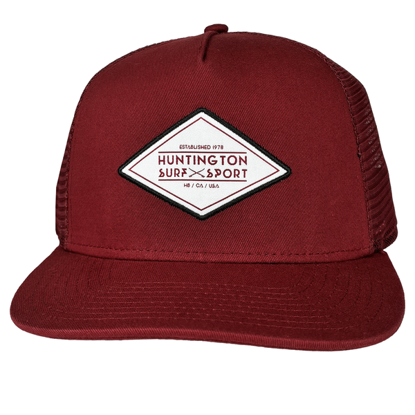 red hat with stitched white diamond shaped HSS patch