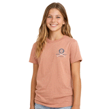 Young girl wearing a pink t-shirt with a logo on a white background