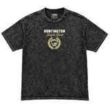 front of washed black t-shirt with small logo with text. Huntington Surf & Sport, El Niño 2026