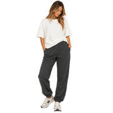 woman wearing grey sweatpants with white tee