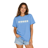 person wearing blue t-shirt with image of hibiscus flowers and text " java point coffee huntington beach, ca"