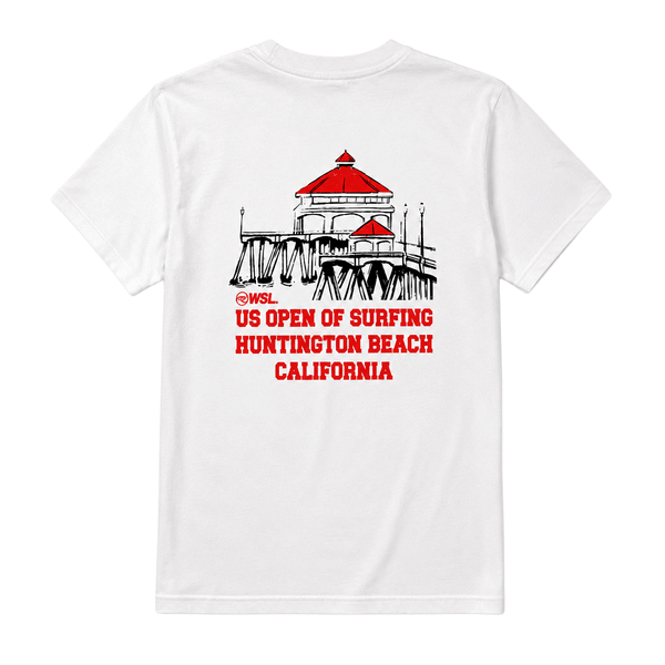 white US Open of Surfing t-shirt against a clean white background. The shirt features a back graphic of the Huntington Beach Pier with red rooftops and black linework above red text reading “US Open of Surfing Huntington Beach California.”