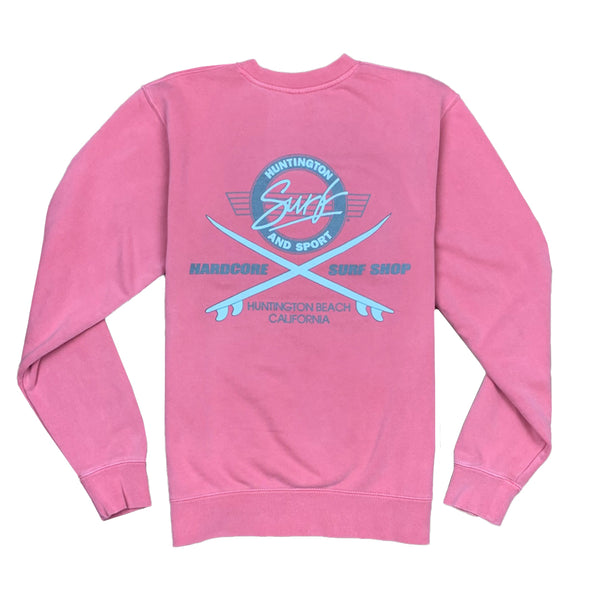 Pink sweatshirt with grey graphic on a white background