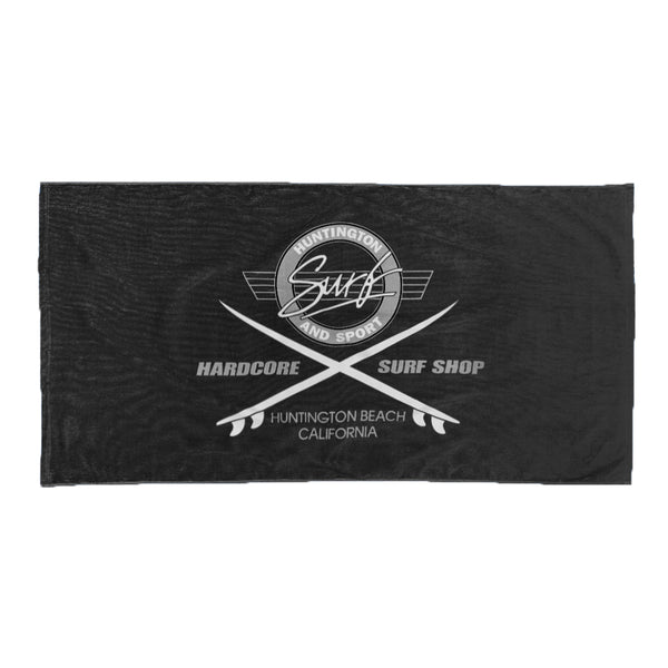 Black towel with white logo and text on a white background