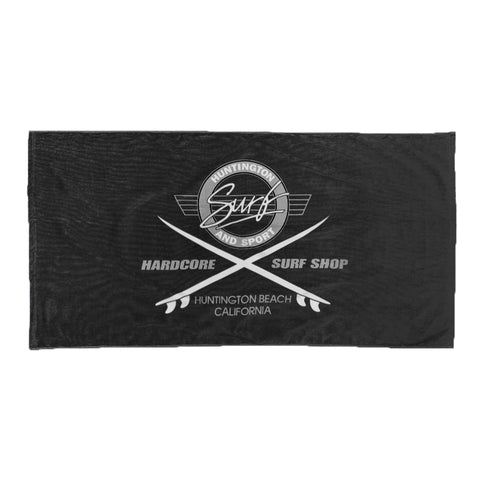 Black towel with white logo and text on a white background