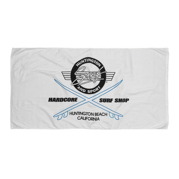 White towel with black and blue graphics and text on a white background