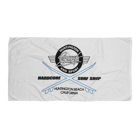 White towel with black and blue graphics and text on a white background