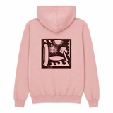 back of pink hooded sweatshirt with silhouette of surfboards trees and waves
