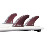 tail of surfboard with 3 surf fin attached