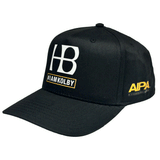 side of black hat with AIPA Surfboards logo in yellow