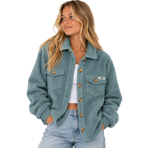 Model wearing the HSS women's teal fleece shirt.