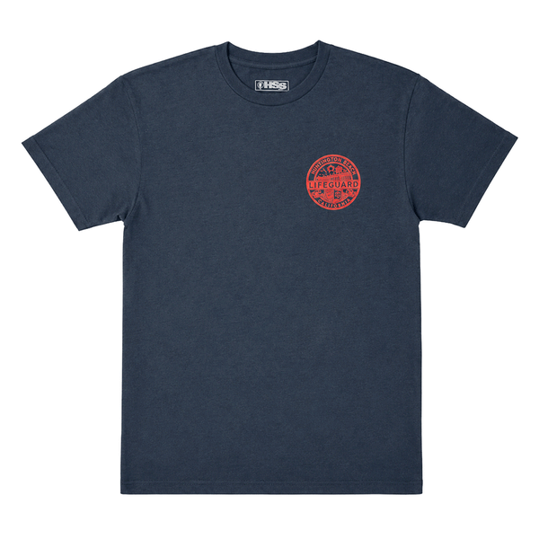 front of navy Huntington Beach Lifeguard men's T-shirt with small red lifeguard emblem graphic.