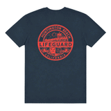 Back of navy Huntington Beach Lifeguard men's T-shirt with large red lifeguard emblem graphic.