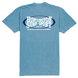 Blue t-shirt with 'Huntington Surf Sport' logo on the back against a white background