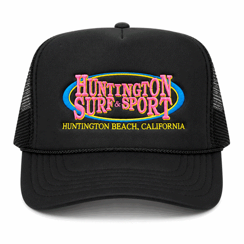black trucker hat with 80's inspired logo on white background