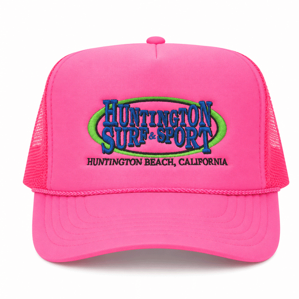 hot pink trucker hat with 80's inspired logo on white background