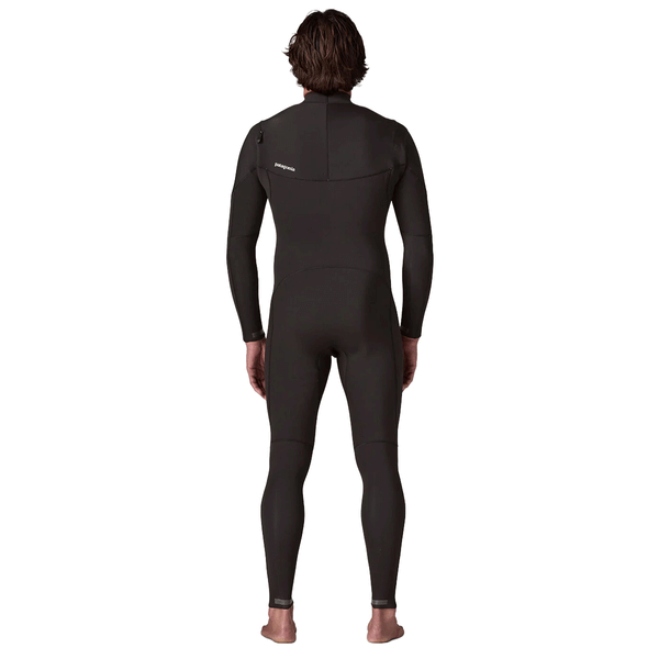 back view of man wearing a black chest zip wetsuit