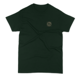 Black t-shirt with a small logo on a white background