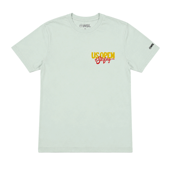 Front view of a light sage green men's T-shirt displayed on a clean white background. The shirt features a small "US Open of Surfing" logo on the left chest in yellow and red. A subtle gray WSL logo is printed inside the collar, and a small black WSL logo appears on the right sleeve. The classic crewneck T-shirt has a relaxed fit and minimalist front design inspired by the Huntington Beach surf event.