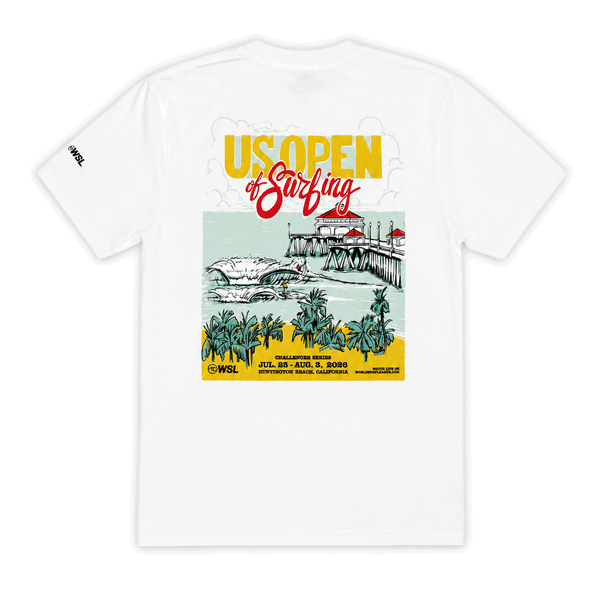 Back view of a light white men's T-shirt displayed on a clean white background. The shirt features a large, colorful "US Open of Surfing" graphic centered on the back, showcasing the Huntington Beach Pier, ocean waves, palm trees, and event branding in yellow, red, teal, and black. A small WSL logo is printed on the left sleeve. The design highlights the Huntington Beach, California surf event with a vibrant coastal illustration and retro-inspired typography.