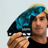 jack robinson holding his signature surf fin