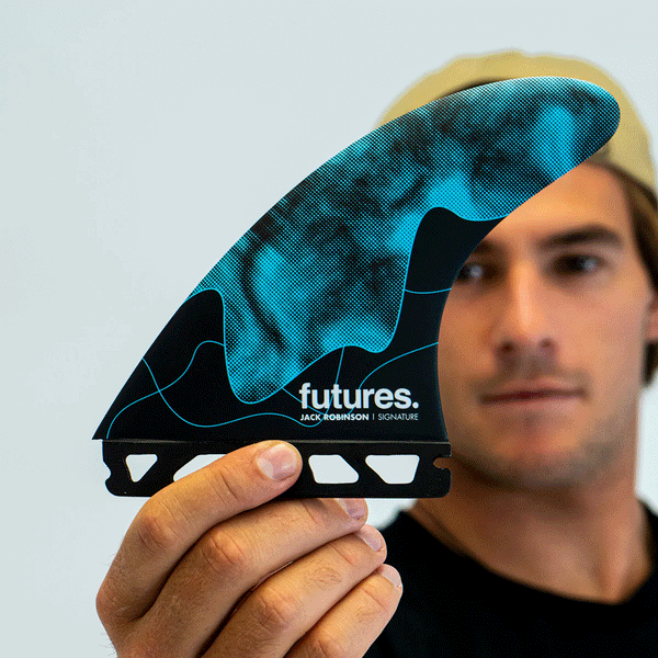 jack robinson holding his signature surf fin