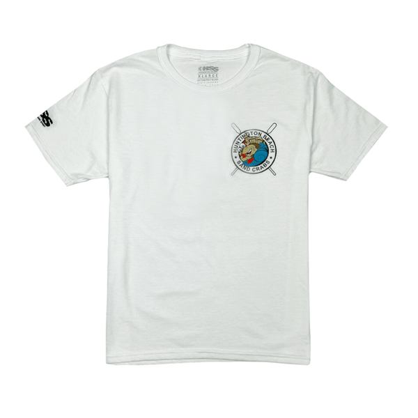white t-shirt with small HB Sandcrabs logo on a white background