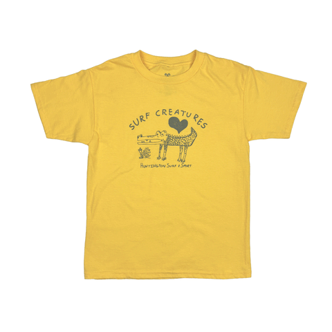 yellow  t-shirt with drawing of a cute crocodile with text "surf creatures"