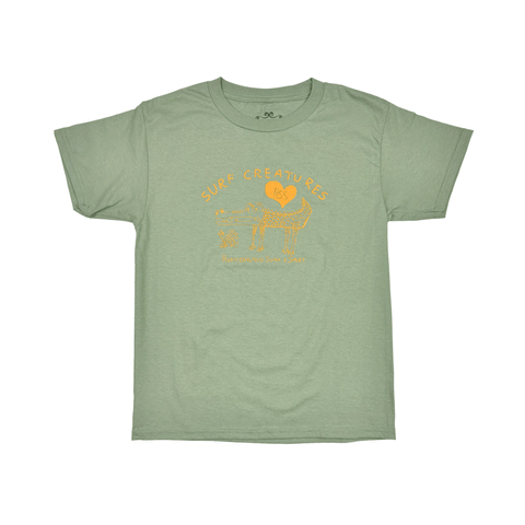 green t-shirt with drawing of a cute crocodile with text "surf creatures"