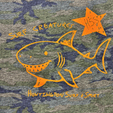 orange print of shark and words "surf creatures" 