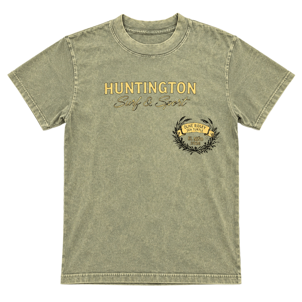 front of a washed green t shirt with a yellow text of Huntington surf & sport, Olive ridley Sea turtle