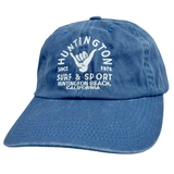 blue dad hat with white script and image of the shaka sign on white background