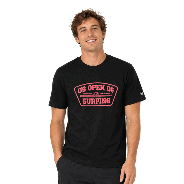 person wearing black t-shirt with US Open's Shield logo in red on white background