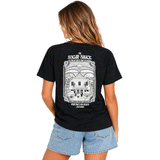 back of woman wearing black t-shirt with large white drawing of The Sugar Shack