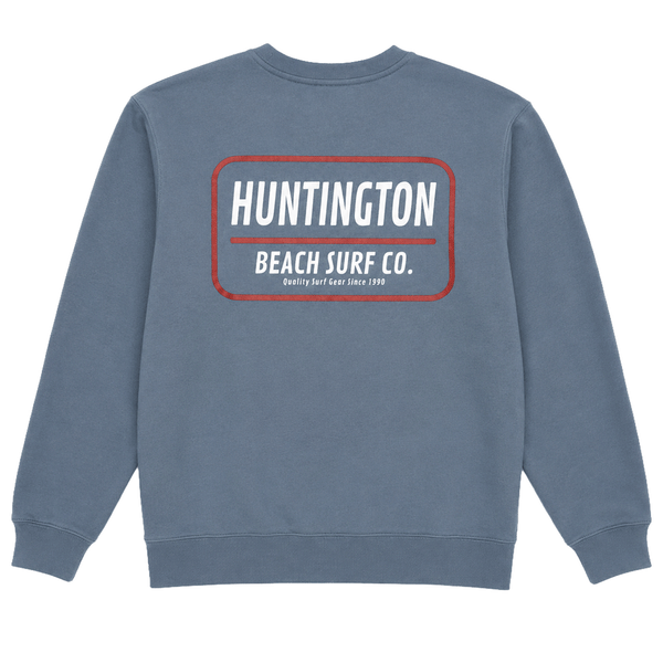 Slate blue Huntington Beach Surf Co. crewneck sweatshirt showing large back graphic on a white background.