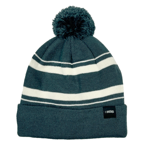 green and white striped pom beanie on white background