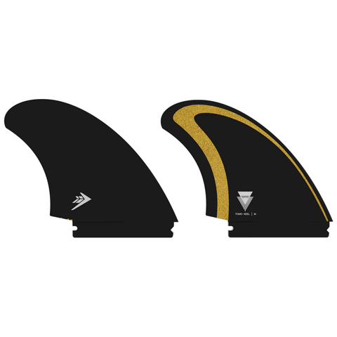 2 black and tan keel surf fins with "firewire" and "Tomo" branding