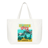 a cream canvas US Open of Surfing Huntington Beach tote bag with a colorful retro beach and pier graphic on a white background.