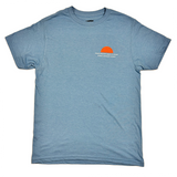 front of blue tshirt with image of sunset and words huntington surf and sport